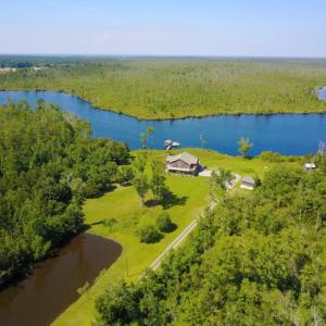 Photo of UNDER CONTRACT!  Waterfront Home with 11 Acres of Land For Sale in Tyrrell County NC!