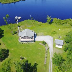 Photo of UNDER CONTRACT!  Waterfront Home with 11 Acres of Land For Sale in Tyrrell County NC!