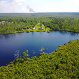 Photo of UNDER CONTRACT!  Waterfront Home with 11 Acres of Land For Sale in Tyrrell County NC!