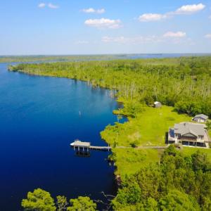 Photo of UNDER CONTRACT!  Waterfront Home with 11 Acres of Land For Sale in Tyrrell County NC!