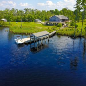 Photo of UNDER CONTRACT!  Waterfront Home with 11 Acres of Land For Sale in Tyrrell County NC!