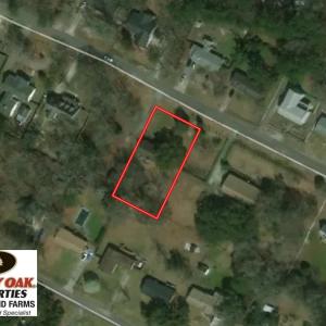 Photo of UNDER CONTRACT!  .46 Acre Residential Lot with Brick Home For Sale in Brunswick County NC!