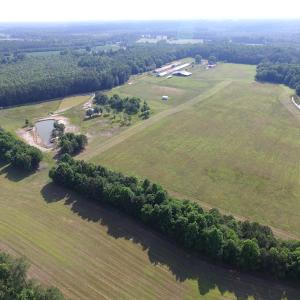 Photo of UNDER CONTRACT!  55 Acres of Farm Land with Log Home For Sale in Suffolk County VA!
