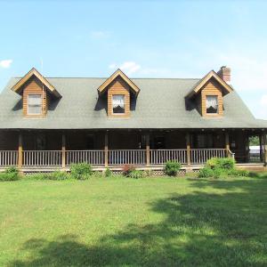 Photo of UNDER CONTRACT!  55 Acres of Farm Land with Log Home For Sale in Suffolk County VA!