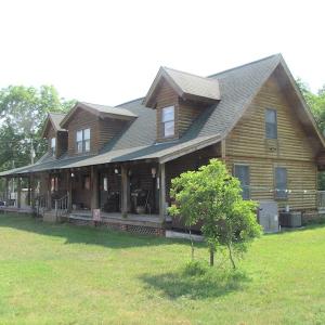 Photo of UNDER CONTRACT!  55 Acres of Farm Land with Log Home For Sale in Suffolk County VA!