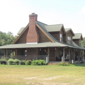 Photo of UNDER CONTRACT!  55 Acres of Farm Land with Log Home For Sale in Suffolk County VA!