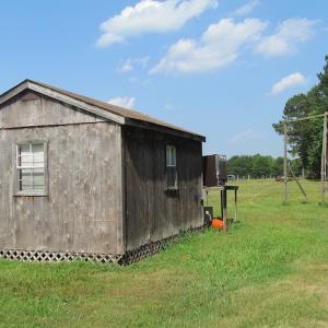 Photo of UNDER CONTRACT!  55 Acres of Farm Land with Log Home For Sale in Suffolk County VA!