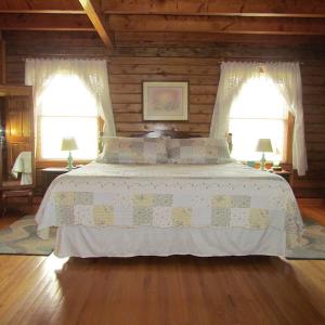 Photo of UNDER CONTRACT!  55 Acres of Farm Land with Log Home For Sale in Suffolk County VA!