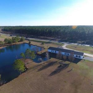 Photo of SOLD!!  8.32 Acres of Commercial and Development Land with Home in Columbus NC!