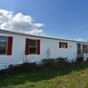 View of front facade with metal roof