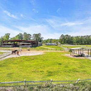 View of yard featuring an exterior structure, an o