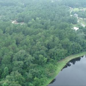 Aerial view of property and surrounding area featu