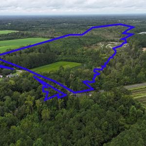 View of rural area featuring a heavily wooded area