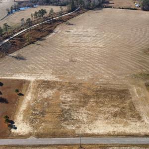 Aerial view of property and surrounding area featu