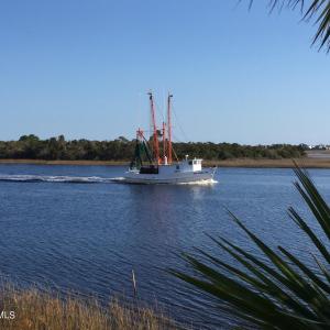 Shrimp boat heading out to sea