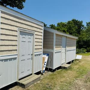 Two sheds convey