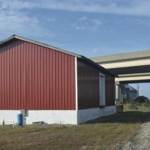 enclosed building next to railroad