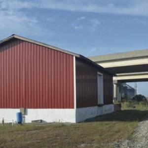 enclosed building next to railroad