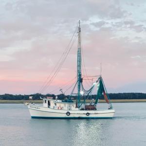 Shrimp Boat heading up Shallotte River