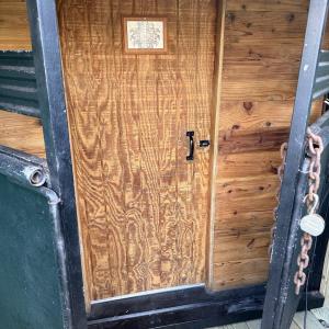 INSIDE TRAILER DOOR TO BED