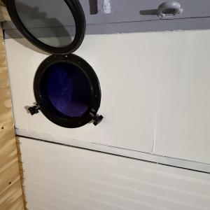 INSIDE TRAILER PORTHOLE WINDOW