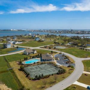 Water view with clubh pool courts