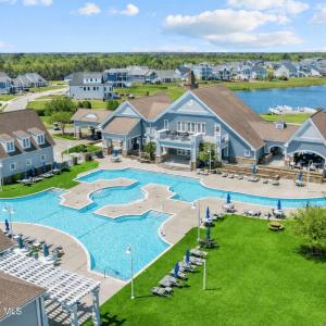Community pool with scenic neighborhood