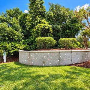 Sunny Shell-Decorated Garden Entrance