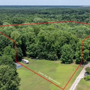 Wooded Lot measures 600'on right side