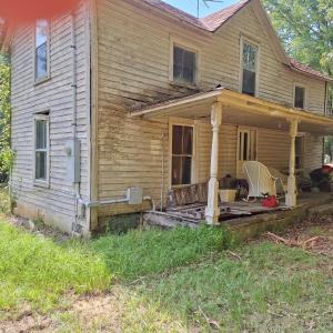 HOUSE FRONT AND PORCH AFTER CLEAN UP
