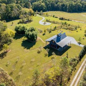 Rolling Pastures and Woodline