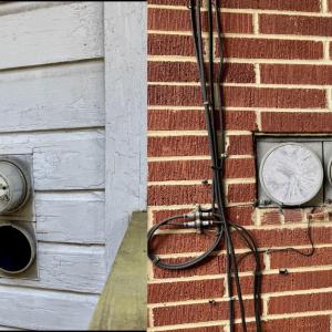 Electric meters on ranch homes