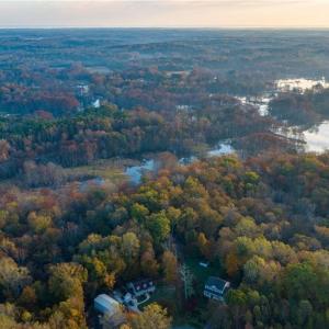 Aerial view of the property showing Diacsund Creek frontage to the view.