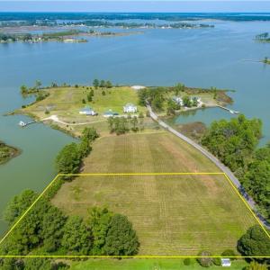 Located on a stunning point of land