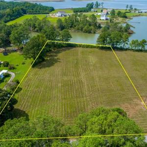 Located on a stunning point of land