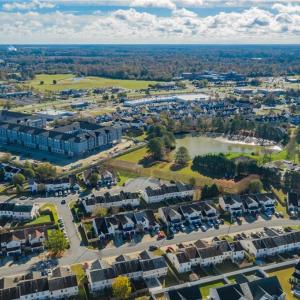 ANOTHER NEW APT. BUILDING & SUBDVISION NEAR SITE