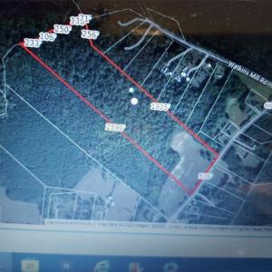 LOT 42-14 IS LONG & OUTLINED IN RED