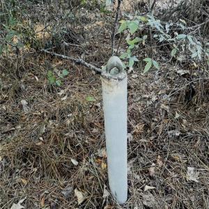 To the left of the land