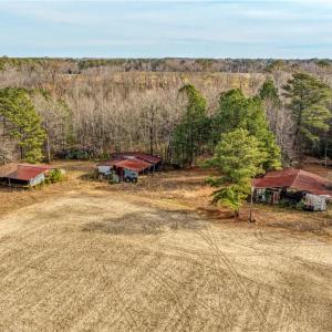 Old ball field area & buildings behind the driveway 1 access to property