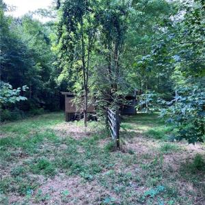 Trails to both buildings.