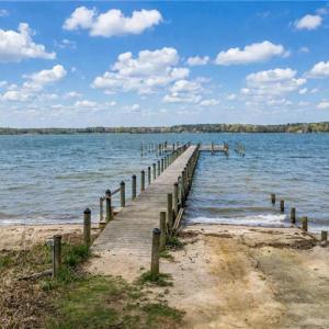 Boat ramp, dock and beach on river