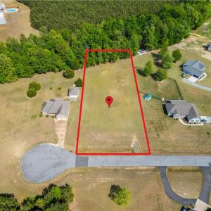 Set in a private cul-de-sac. Lot lines are approximated on photo, but are clearly marked with flags on the property.