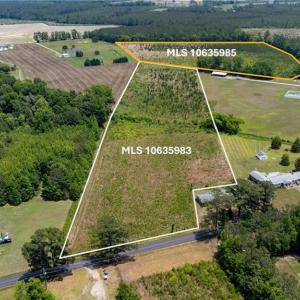 9.77 AC lot with available adjacent 16.03 AC lot outlined in orange