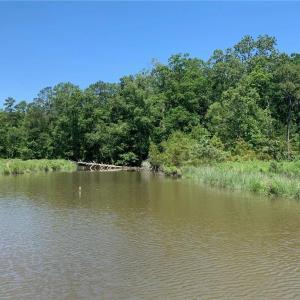 PHOTO FROM BOAT OF PROPERTY WATERFRONT