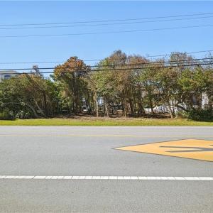 Ground-level view across from Sandpiper Rd.