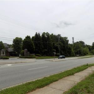 Road frontage with sidewalk.