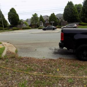 Curbing into turn in for property off New Garden Road