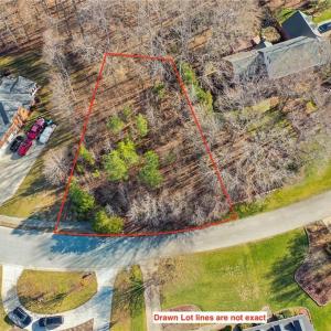 Lot 28,  .56ac, Bring your own Builder, municipal utilities at road.