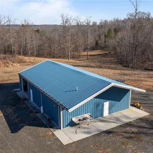 2400 sq foot insulated (R-13) Renegade steel building (built in 2016) with 3 commercial garage door entries