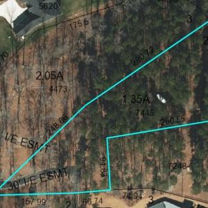 200 feet of waterfront beginning just to the right of the boathouse (boathouse not included).